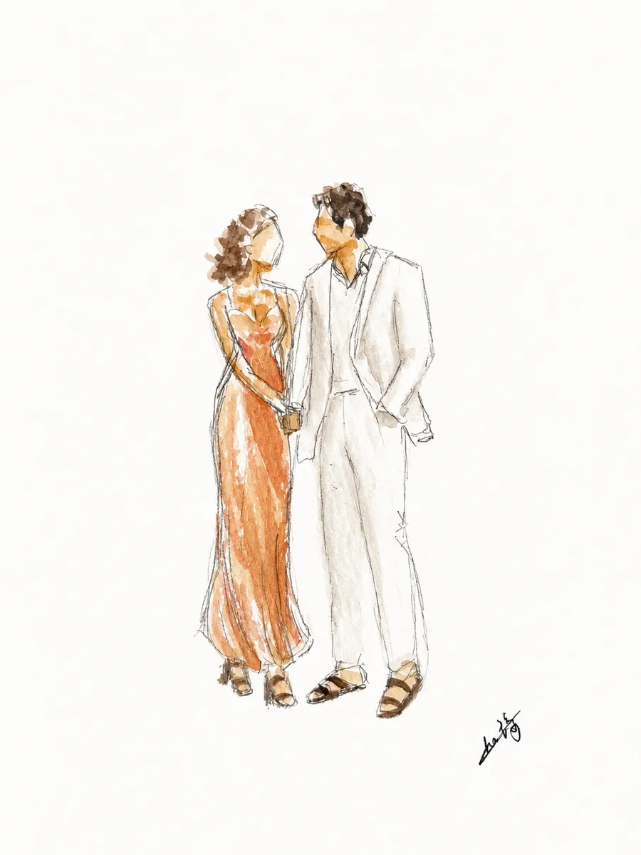 Silhouette de mode d'un couple : robe longue orange et costume blanc